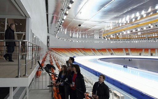 Russia's President Vladimir Putin (L) visits the Speed Skating centre 'Adler Arena' in Sochi, on February 7, 2013